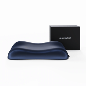 SweetNight CoolNest ergonomic cooling pillow two-pack with CoolGlide fabric cover on a bed