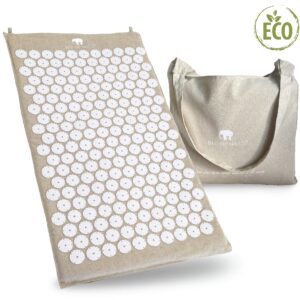 Bed of Nails ECO acupressure mat with organic linen cover and rows of white spike discs