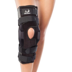BioSkin Gladiator hinged knee brace in black with wraparound straps and 15-inch side hinge, size M