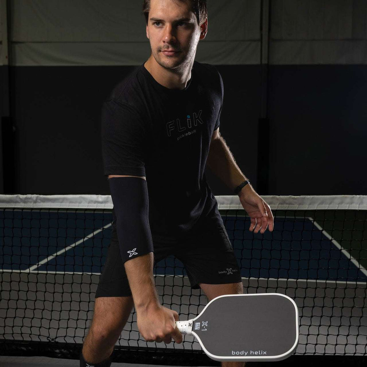 Black body helix full elbow compression sleeve in size small, shown flat — view 4
