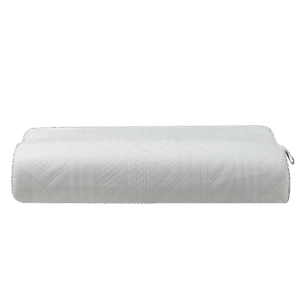 Sleepwell Impressfit Ortho memory foam pillow with contoured surface on a bed