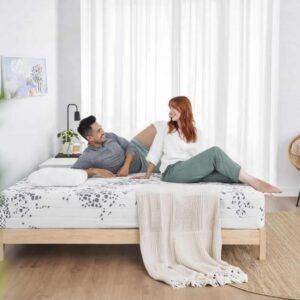 Majestic 9000 extra firm double mattress in 135 x 190 cm, shown uncovered on a plain bed base