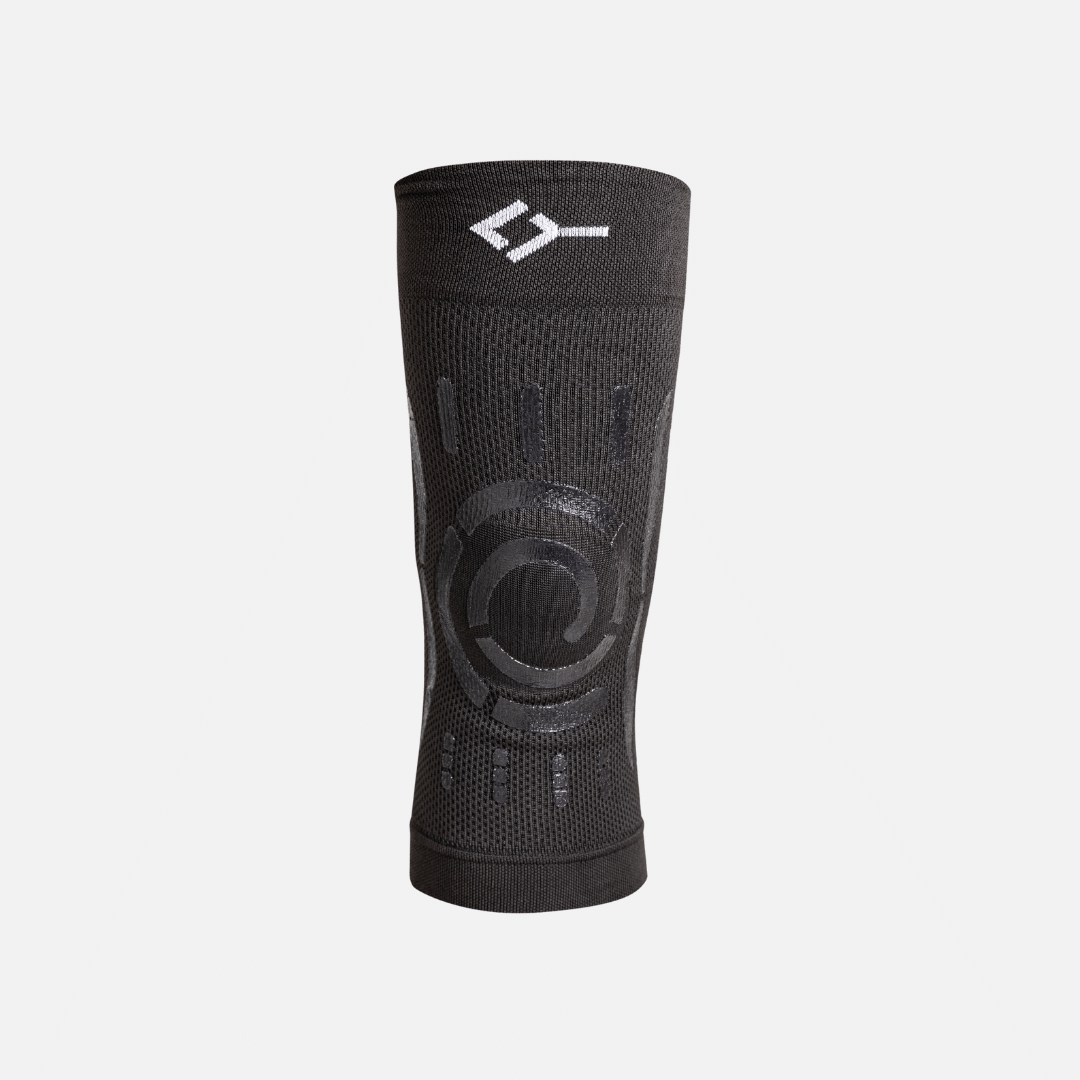 Black Floky compression knee brace in size L-XL for the right knee, shown flat with silicone support bands — view 3