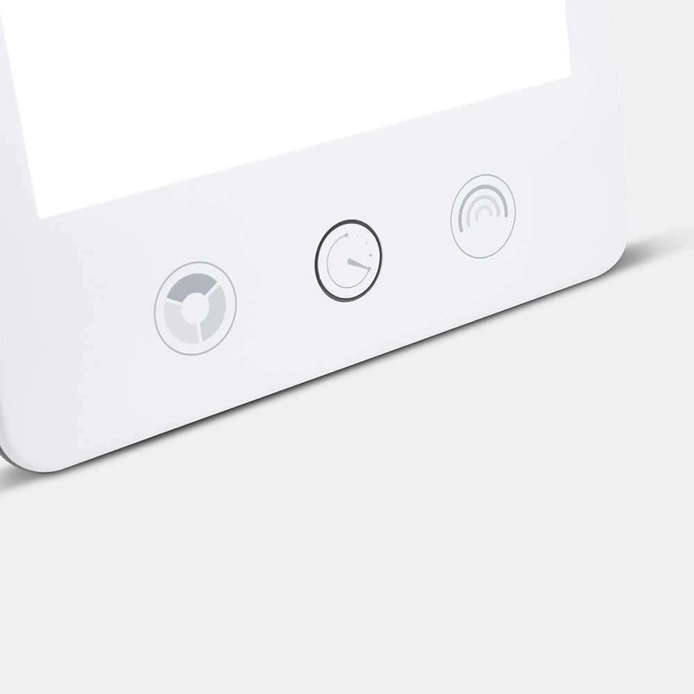 The three touch controls on the front of the HappyLight Luxe: colour, timer and brightness