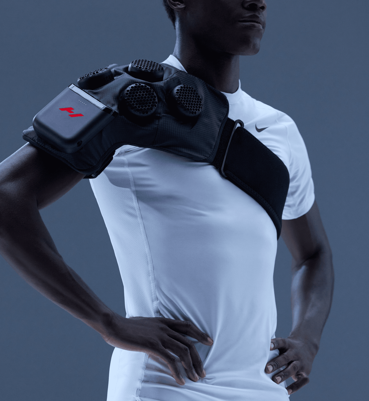Hyperice X contrast therapy shoulder wrap strapped over a person's shoulder — view 3