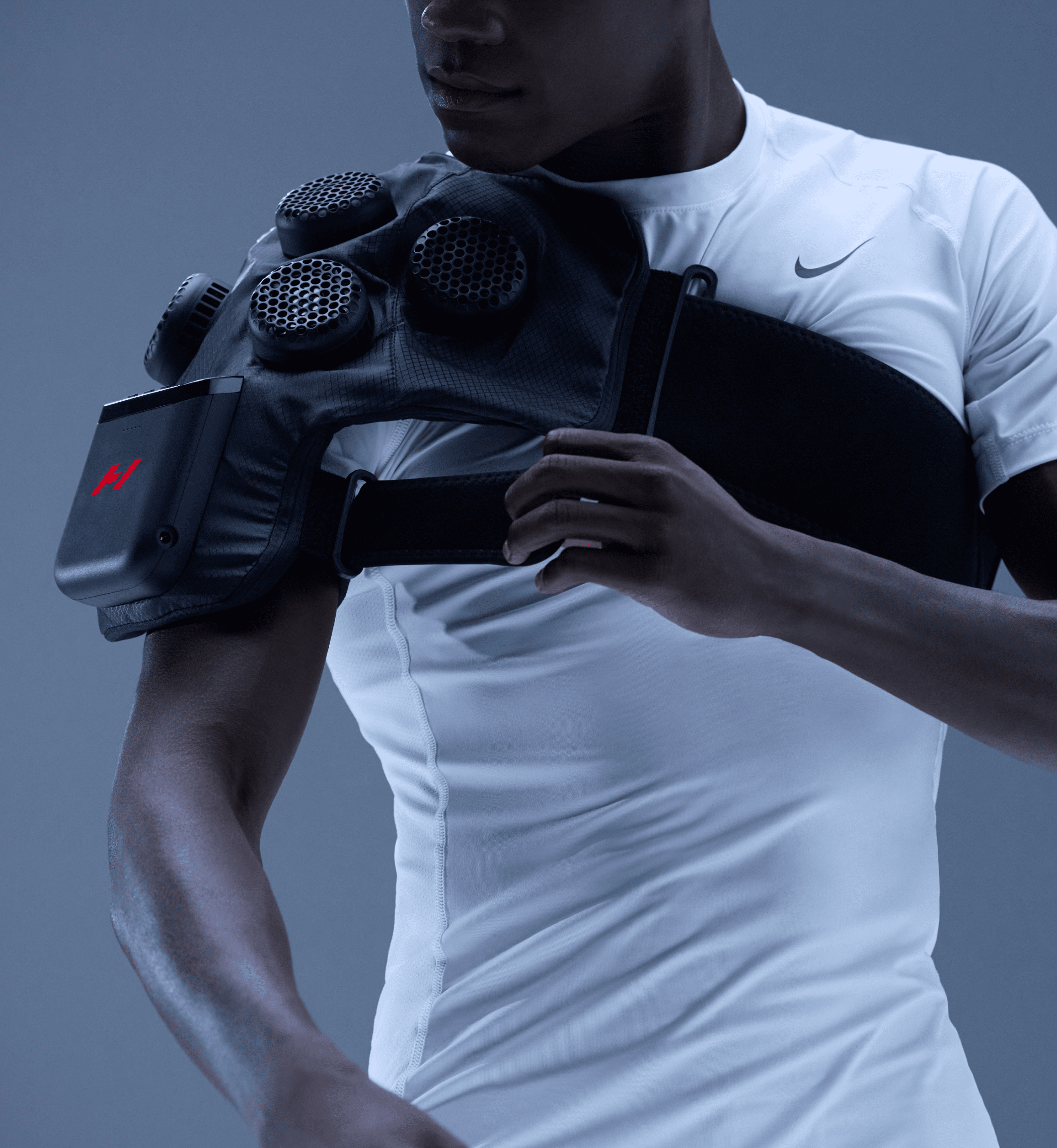 Hyperice X contrast therapy shoulder wrap strapped over a person's shoulder — view 4