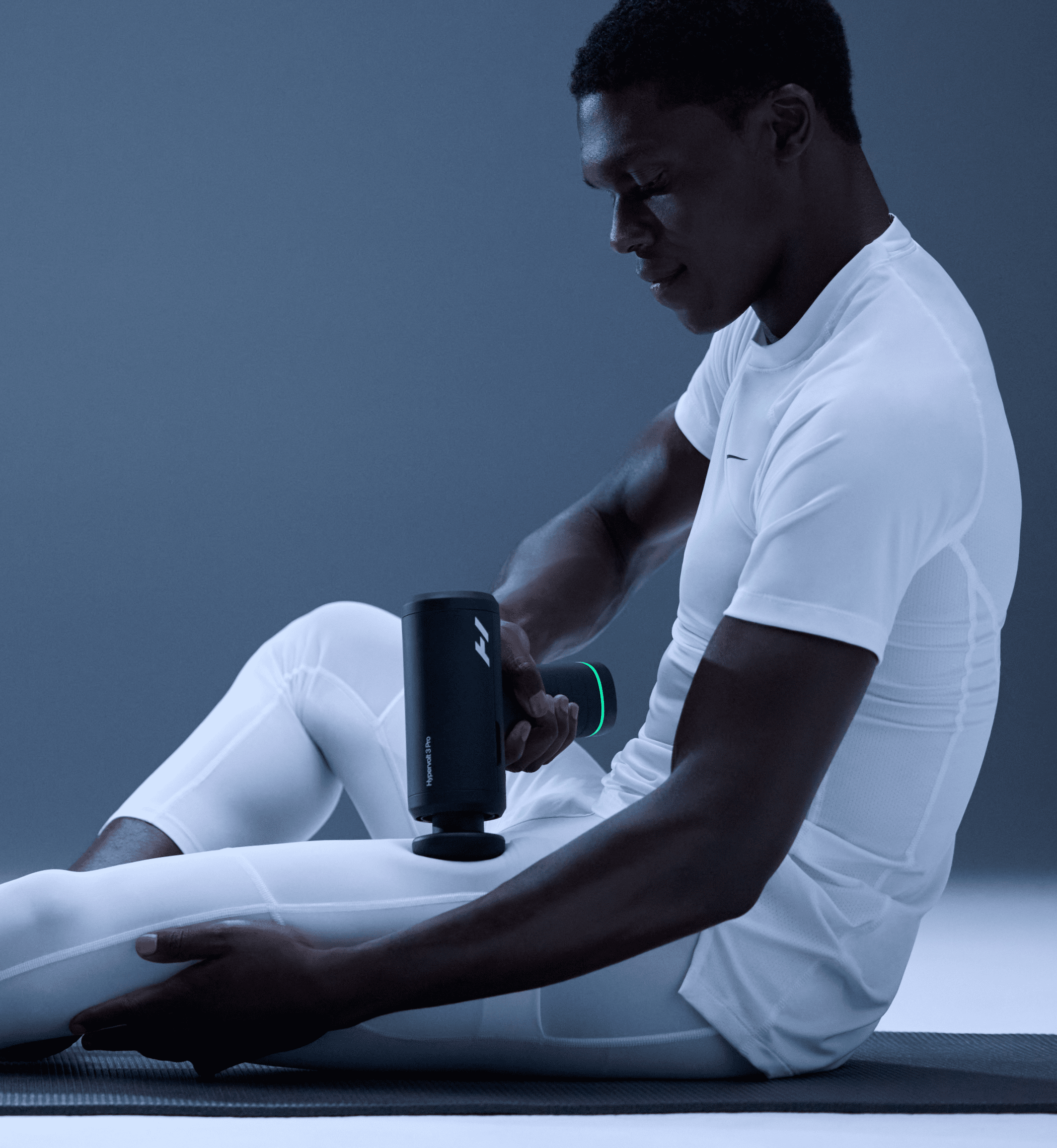 Hypervolt 3 Pro massage gun being used on the leg