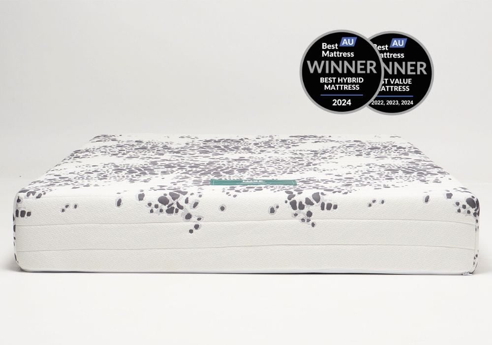 Majestic 9000 extra firm double mattress in 135 x 190 cm, shown uncovered on a plain bed base — view 3