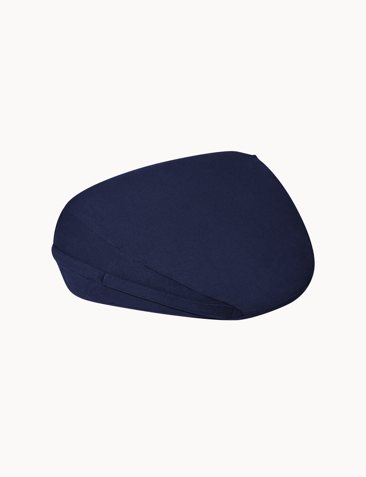 Dame Pillo positioning pillow in Indigo on a white background
