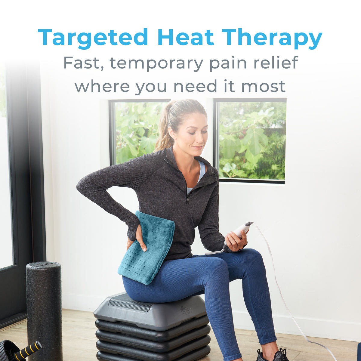 XL heating pad with microplush cover and detachable LCD controller showing heat settings — view 3