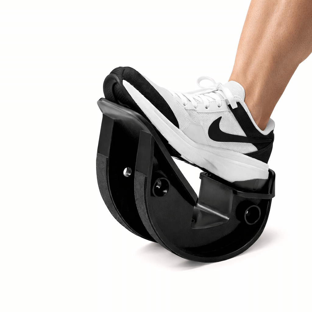 PlayMakar plantar fasciitis foot rocker stretching tool with a curved base on a floor