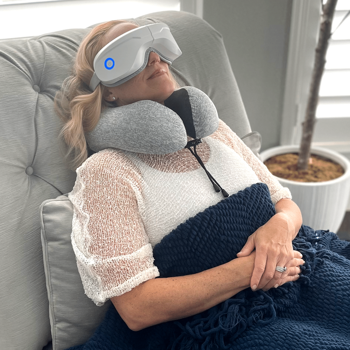 iReliev memory foam travel pillow curved to cradle the neck, shown from the side — view 3