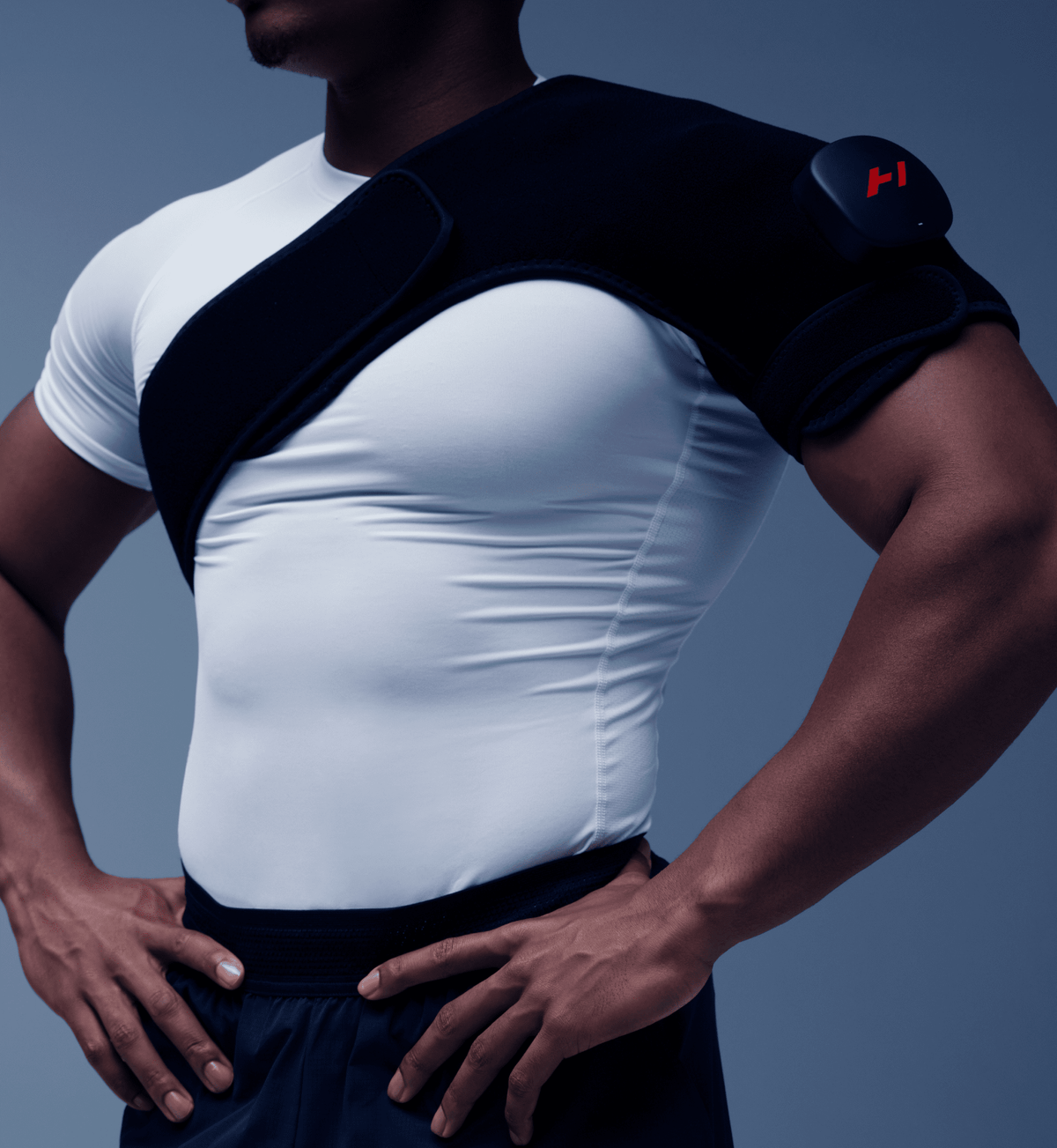 Hyperice Venom 2 heated shoulder massager neoprene wrap worn over the shoulder — view 3