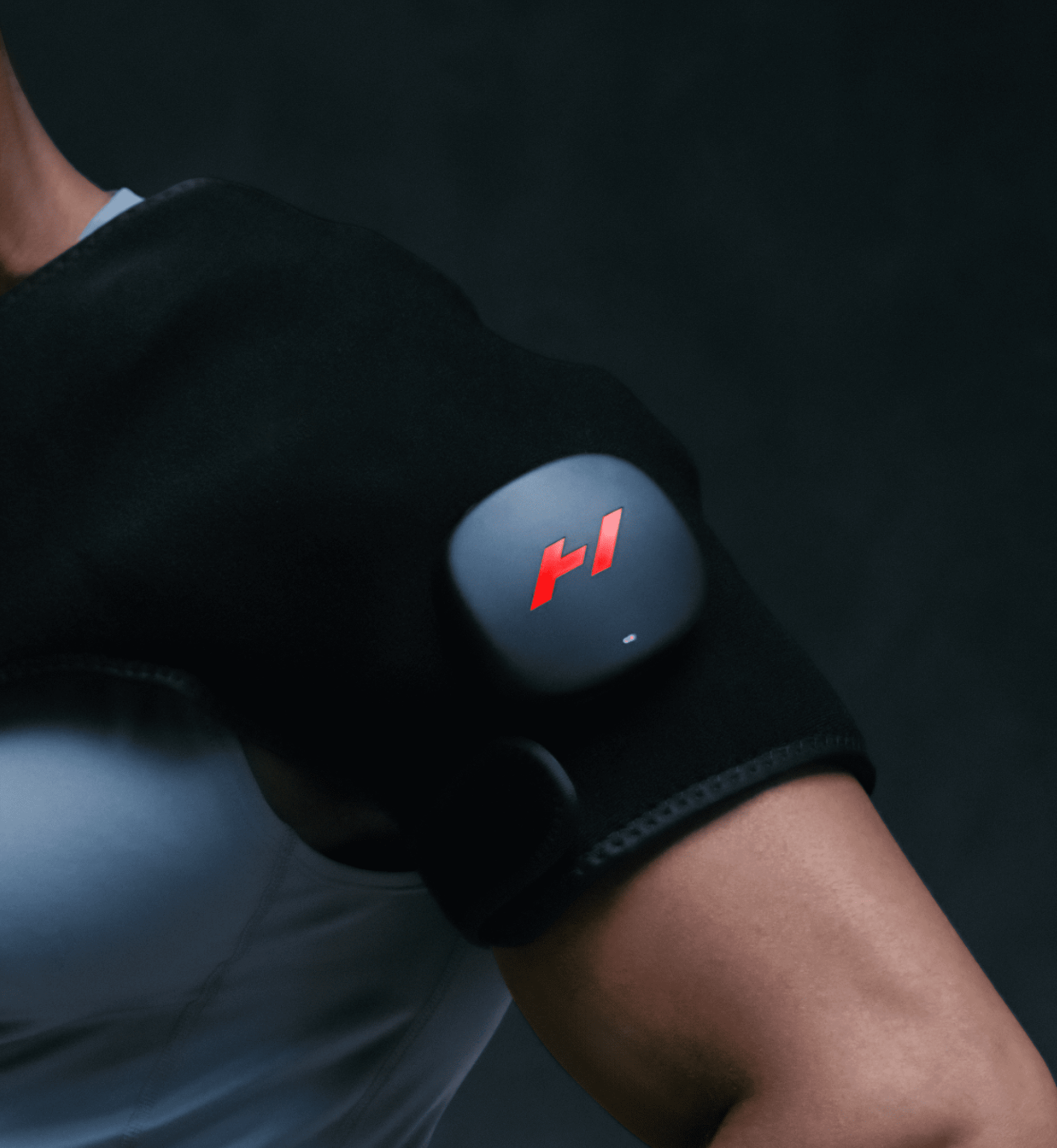 Hyperice Venom 2 heated shoulder massager neoprene wrap worn over the shoulder — view 4