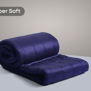 Sleepycat Weighted Blanket in Midnight Blue, rolled, showing the quilted pockets