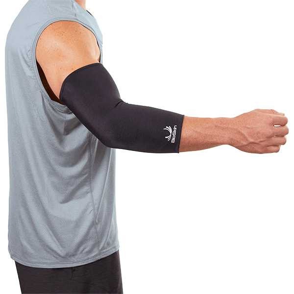 BioSkin compression elbow sleeve in medium worn on a bent arm