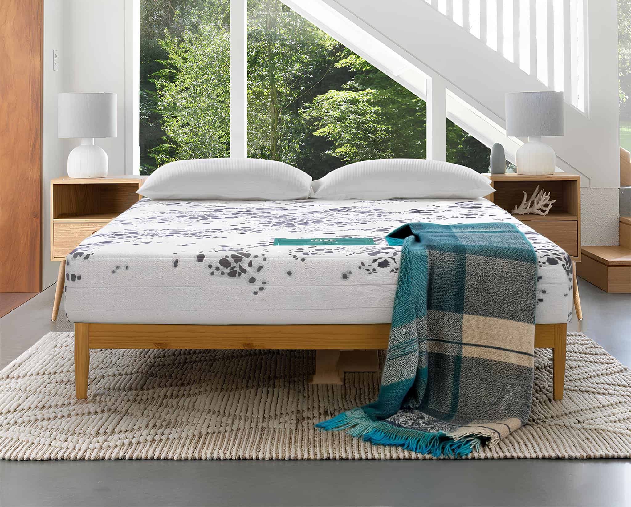 Majestic 9000 extra firm double mattress in 135 x 190 cm, shown uncovered on a plain bed base — view 4