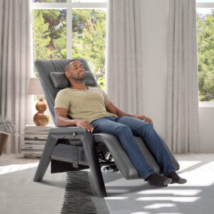 Human Touch Gravis ZG zero gravity massage chair reclined in a living room