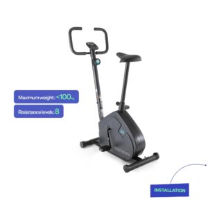 Domyos EB Essential exercise bike in black, side view