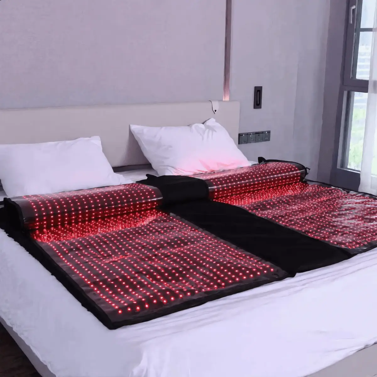 Mvolo red light therapy blanket unfolded, showing the red and near-infrared LED lining inside
