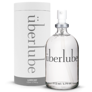 Überlube 112 ml glass bottle with pump next to its tube packaging